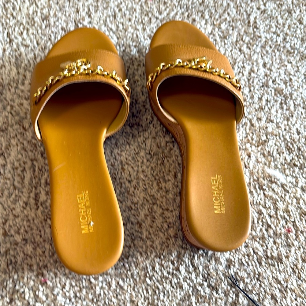 Tan Michael Kors wedges sandals only worn once to small still in the box.